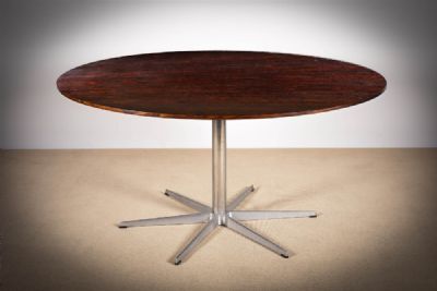 A CIRCULAR 6 STAR SERIES DINING TABLE at deVeres Auctions