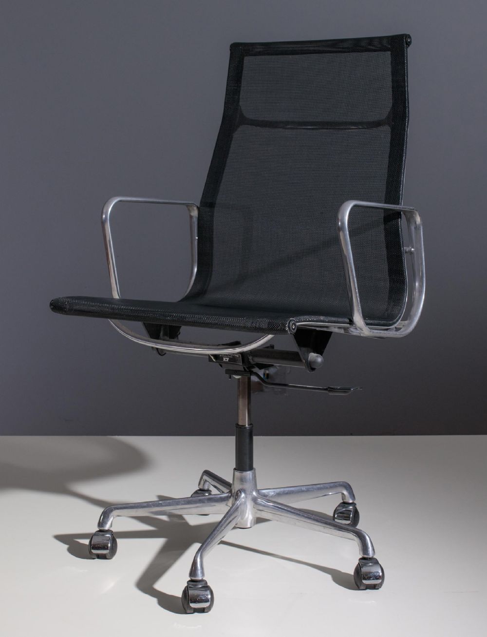 AN E119 EXECUTIVE CHAIR by Charles & Ray Eames  at deVeres Auctions