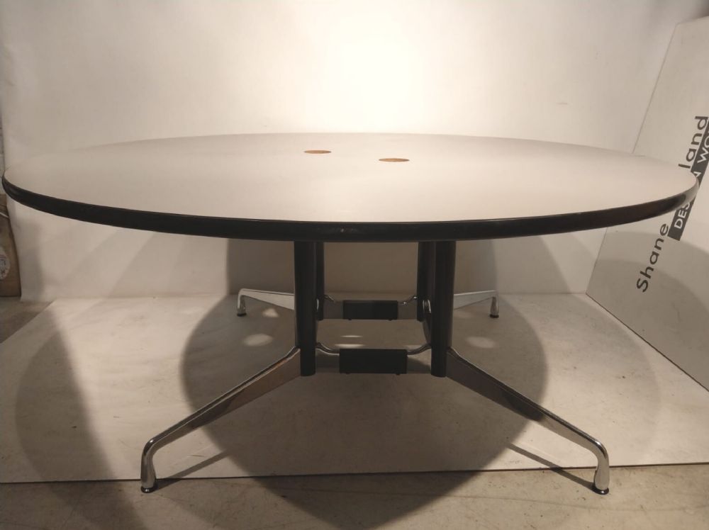 A SEGMENTED TABLE by Charles & Ray Eames  at deVeres Auctions