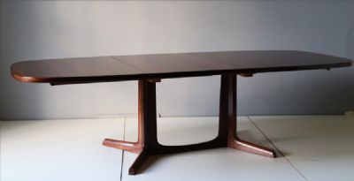 51 by A ROSEWOOD DINING TABLE  at deVeres Auctions