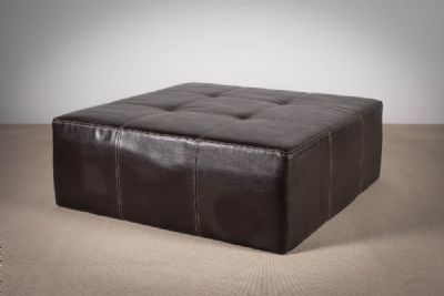 A SQUARE BROWN LEATHER COFFEE TABLE / POUFFE at deVeres Auctions