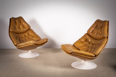 A PAIR OF TANNED LEATHER SWIVEL CHAIRS at deVeres Auctions