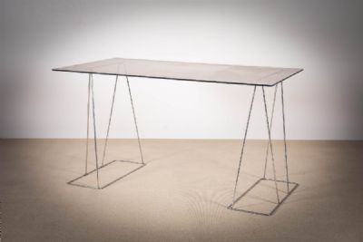 A SMOKED GLASS TOPPED DESK at deVeres Auctions
