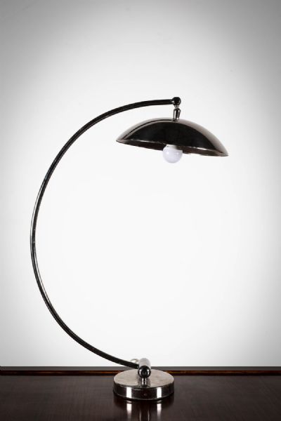 A CHROME ARCHED DESK	LAMP at deVeres Auctions