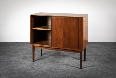 A TEAK SIDE CABINET at deVeres Auctions
