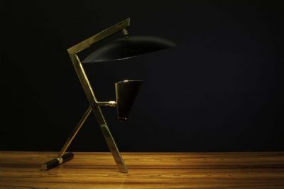 A BLACK METAL EXECUTIVE LAMP by Louis Kalff sold for €360 at deVeres Auctions