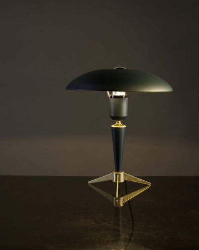 A BLACK METAL EXECUTIVE LAMP by Louis Kalff sold for €360 at deVeres Auctions