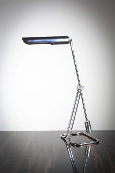 A TUBULAR CHROME ANGULAR DESK LAMP at deVeres Auctions