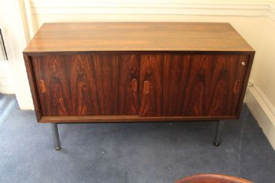 A ROSEWOOD LOW CABINET at deVeres Auctions