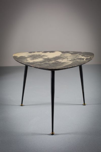 A TRIANGULAR LOW TABLE at deVeres Auctions