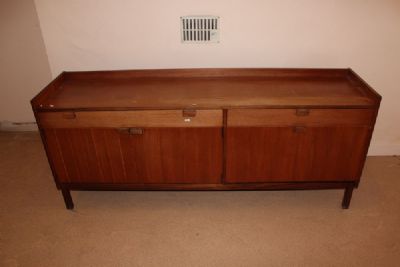 A TEAK SIDEBOARD at deVeres Auctions