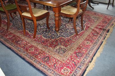 A LARGE TURKISH RUG at deVeres Auctions