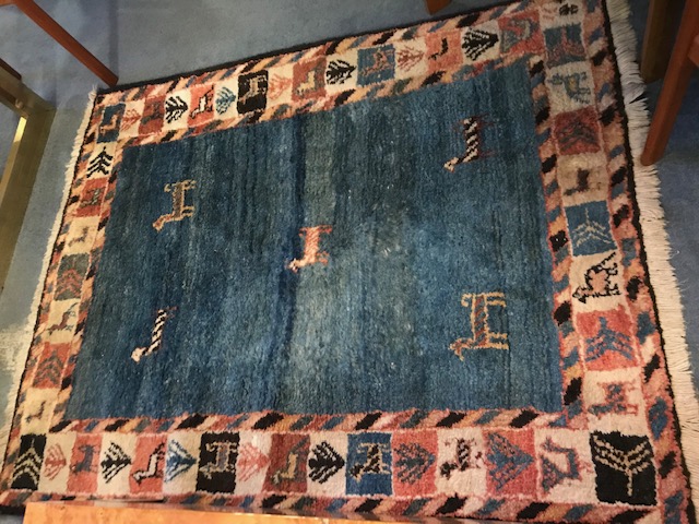 A WOOL RUG at deVeres Auctions