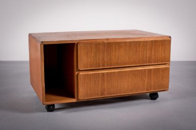 A TEAK LOW CABINET by Komfort  at deVeres Auctions