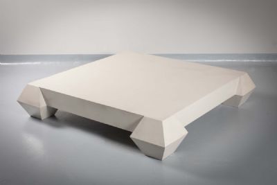 AN ANGULAR SQUARE COFFEE TABLE by Andree Putman  at deVeres Auctions