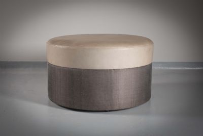TWO LEATHER CIRCULAR POUFFES by Andree Putman sold for €360 at deVeres Auctions