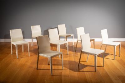 A SET OF EIGHT CREAM LEATHER DINING CHAIRS, by CATTELAN ITALIA sold for €2,200 at deVeres Auctions