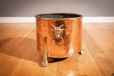 A COPPER CIRCULAR FUEL CONTAINER at deVeres Auctions