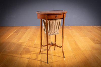 AN OVAL KINGWOOD WORK TABLE, EARLY 19TH CENTURY at deVeres Auctions