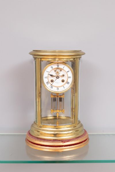A FRENCH BRASS MANTEL CLOCK, c.1900 at deVeres Auctions