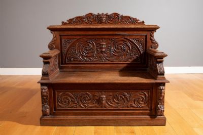 AN OAK HALL BENCH at deVeres Auctions