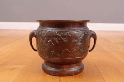 A ORIENTAL BRONZE TWO HANDLED BOWL at deVeres Auctions