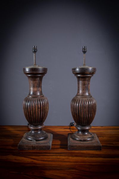 A PAIR OF PAINTED WOODEN TABLE LAMPS at deVeres Auctions