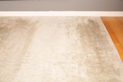 A LARGE FLOOR RUG at deVeres Auctions