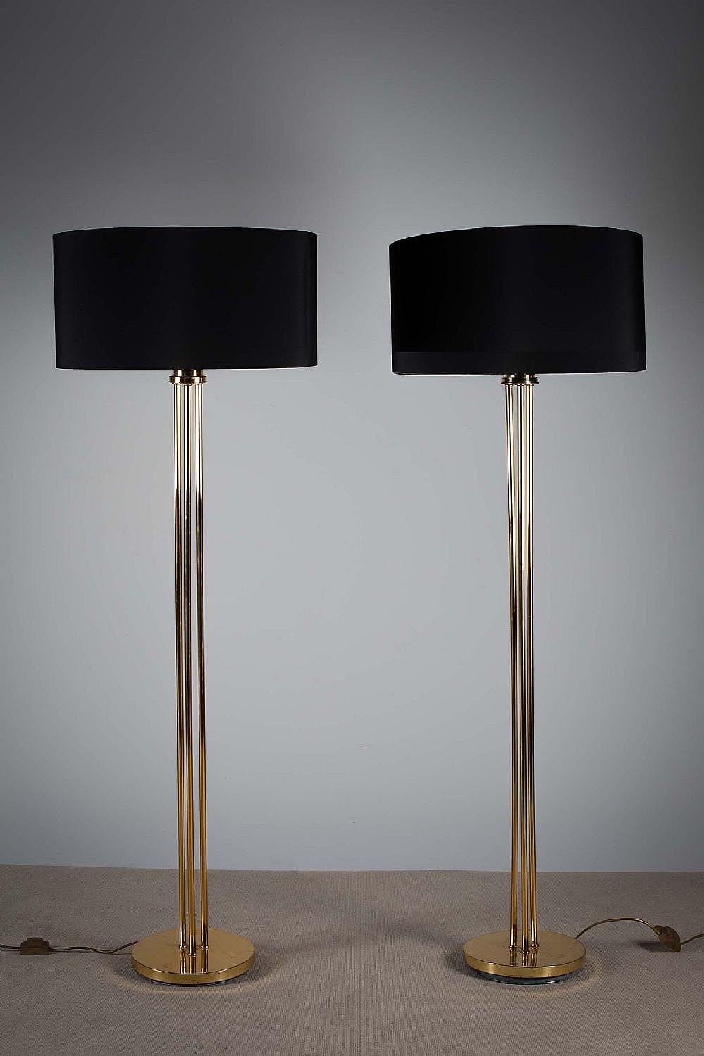 A PAIR OF BRASS STANDARD LAMPS at deVeres Auctions