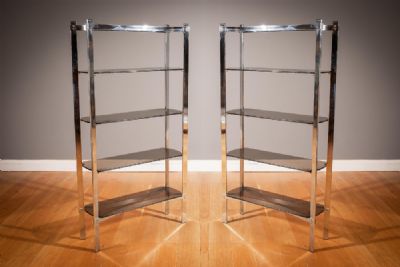 A PAIR OF CHROME UPRIGHT OPEN SHELVES, 1970s, by ARTEMIDE sold for €800 at deVeres Auctions