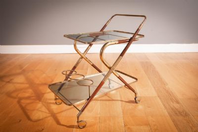 A BRASS AND TEAK COCKTAIL TROLLEY ITALIAN 1960s at deVeres Auctions
