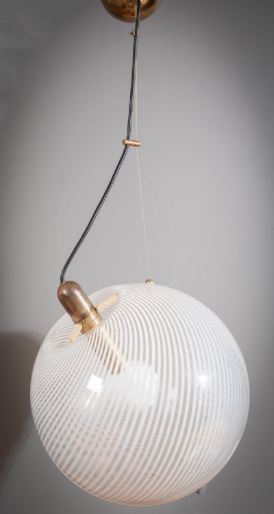 A MILK GLASS GLOBULAR PENDANT LIGHT, by VENINI, ITALY sold for €420 at deVeres Auctions