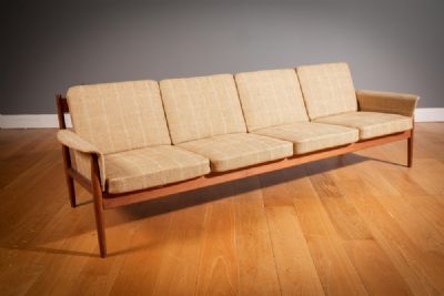A LARGE FOUR SEAT DANISH SETEE, 1970s, by FINN JUHL FOR FRANCE & SON sold for €750 at deVeres Auctions