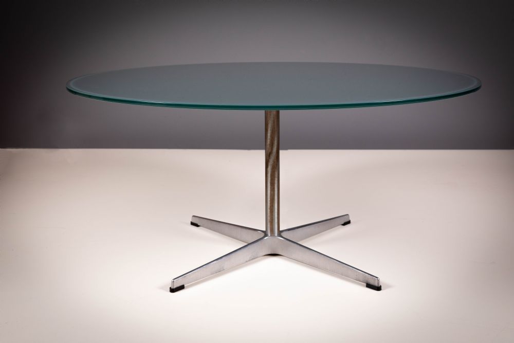 Lot 9 - A MIRRORED CIRCULAR LOW TABLE by Fritz Hansen