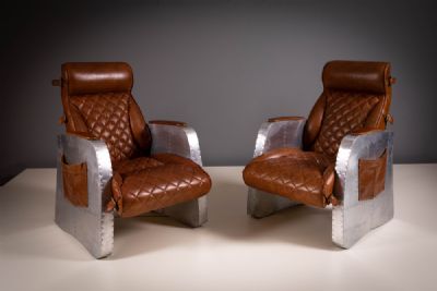 A PAIR OF LEATHER AND ALUMINIUM FRAMED AVIATOR CHAIRS at deVeres Auctions