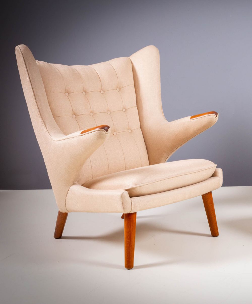 A 'PAPA BEAR' CHAIR, DESIGNED by HANS WEGNER, sold for €6,000 at deVeres Auctions