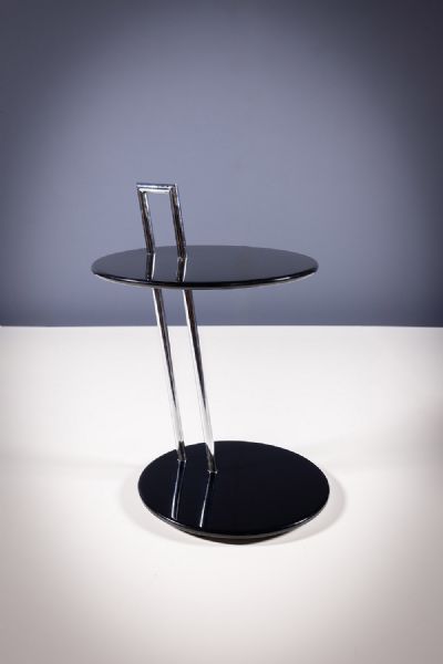 AN EILEEN GRAY BLACK ROUND SIDE TABLE by Eileen Gray sold for €1,400 at deVeres Auctions